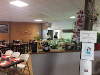 Atmosphère du L'Étape. Bar restaurant à Plounévez-Moëdec - n°18