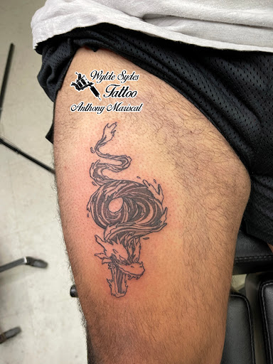 Explore tattoo ideas for men on hand, creative tattoo ideas in San Diego, available at Wylde Sydes Tattoo & Body Piercing