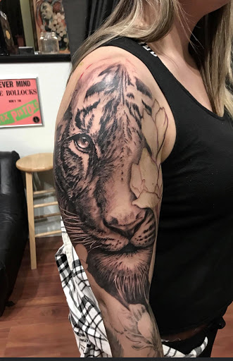 Explore mens forearm sleeve tattoo ideas, creative tattoo ideas in Sunbury, available at Absinthe Tattoo