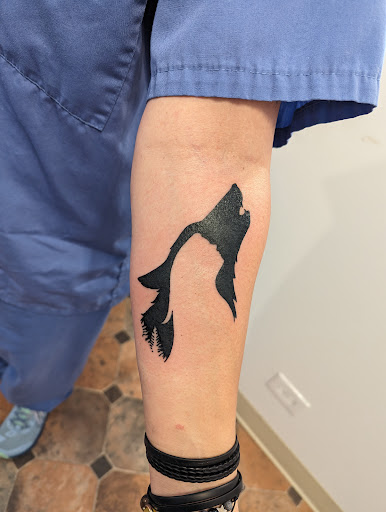 Explore upper back tattoo ideas for men, creative tattoo ideas in Hebron, available at Explosive Ink Tattoo