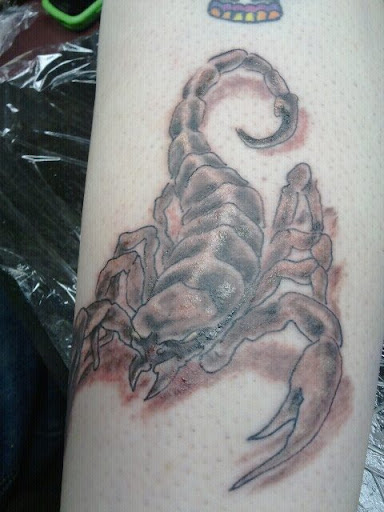 Explore globe tattoo ideas, creative tattoo ideas in Dallas, available at Freak Show Studio