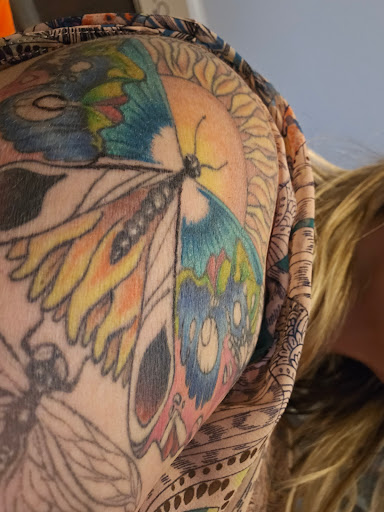 Explore mens side tattoo ideas, creative tattoo ideas in Hernando, available at Watts Studio Tattoos
