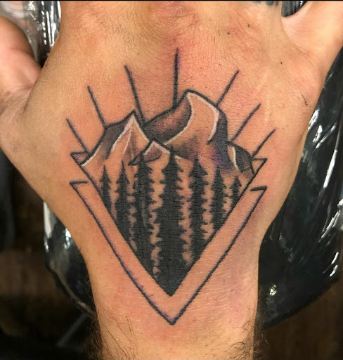 Explore highland cow tattoo ideas, creative tattoo ideas in East Windsor, available at AAA Tattoo