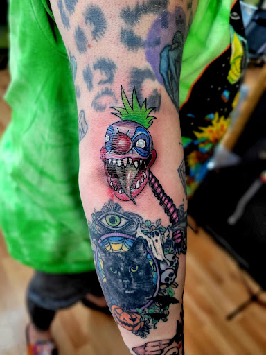 Explore pentagram tattoo ideas, creative tattoo ideas in Benton, available at Spectrum Tattoo