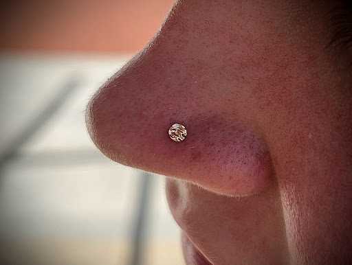 Explore simple neck tattoo ideas, creative tattoo ideas in Roanoke, available at Sati Piercing & Fine Jewelry