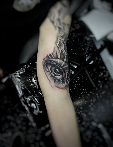 Explore neck tattoo ideas for woman, creative tattoo ideas in Fort Myers, available at Loyal 2 The Coil Tattoos & Piercings (Edison Mall Location Entrance F)