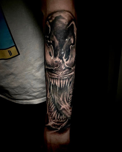 Explore men neck tattoo ideas, creative tattoo ideas in Fort Pierce, available at Hobbit House Tattoo Co