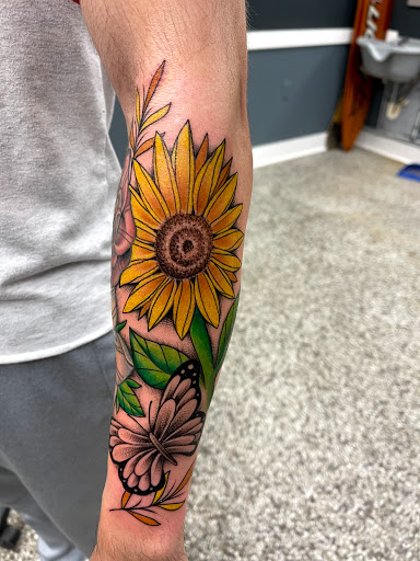 Explore the 1975 tattoo ideas, creative tattoo ideas in Sanford, available at Luv Ink