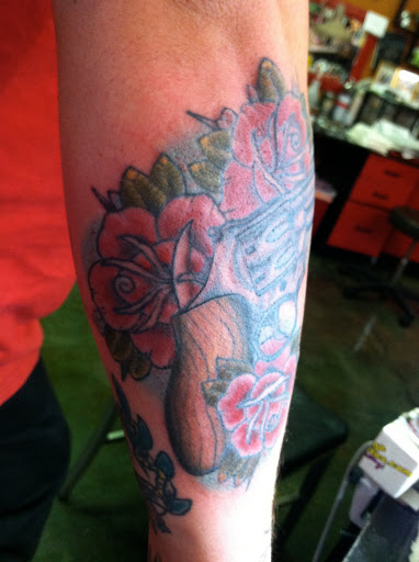 Explore love tattoo ideas, creative tattoo ideas in Reno, available at Aces Tattoo