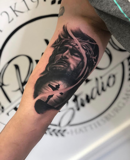 Explore sacred heart tattoo ideas, creative tattoo ideas in Hattiesburg, available at Everything Prime Art Studio