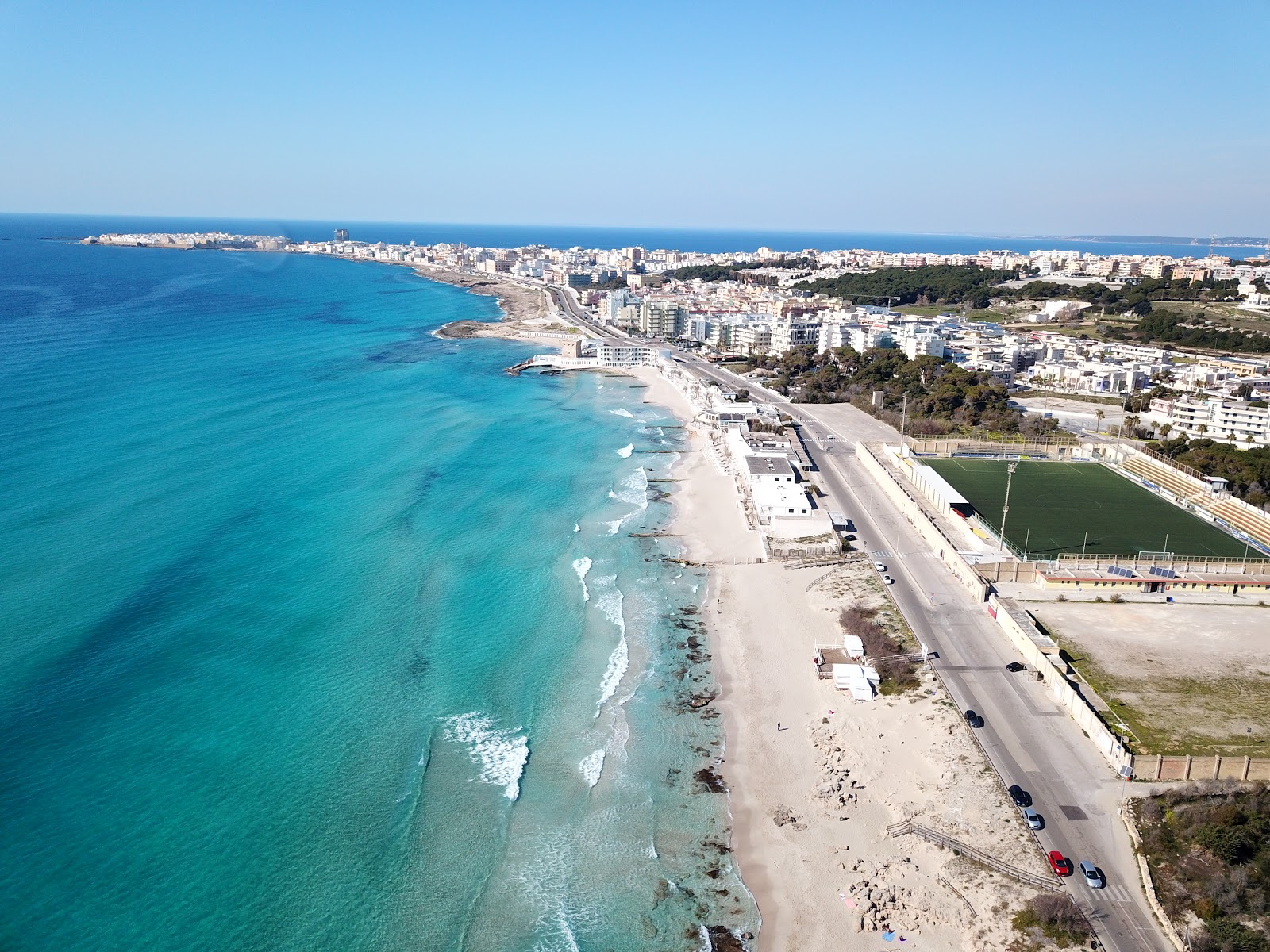 Fotografie cu Spiaggia Gallipoli cu o suprafață de nisip strălucitor