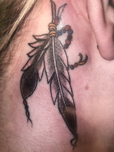 Explore lion and cub tattoo ideas, creative tattoo ideas in San Angelo, available at A1 Tattoos and Piercings