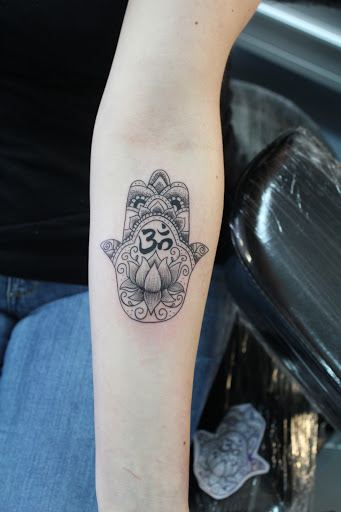 Explore cover up tattoo ideas shoulder, creative tattoo ideas in Fort Myers, available at Tiger Lotus Tattoo and Piercing