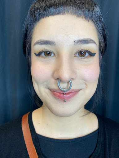 Explore embroidery tattoo ideas, creative tattoo ideas in Orange, available at Symbiosis Body Piercing