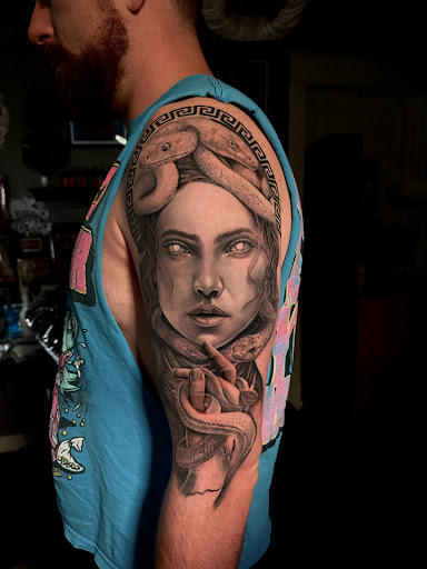 Explore small tattoo ideas behind the ear, creative tattoo ideas in Tiffin, available at Ink Element Tattoo Studio