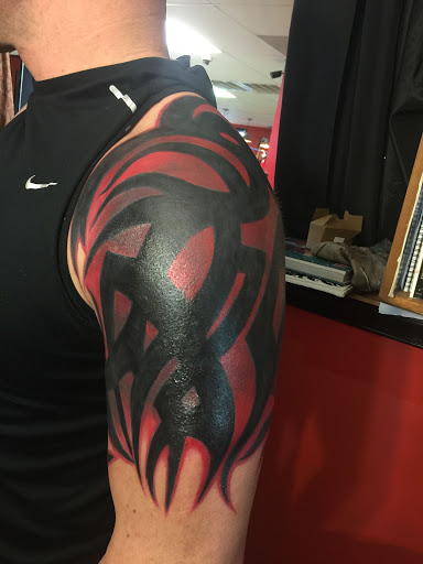 Explore manatee tattoo ideas, creative tattoo ideas in Dover, available at Walls of Wonder Tattoo And Body Piercing