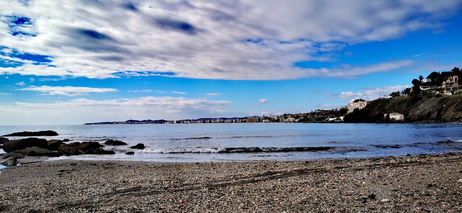 Foto van Playa de Torremuelle met grijs zand oppervlakte