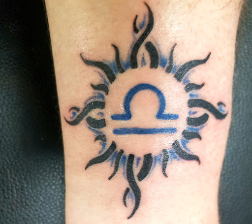 Explore cross tattoo sleeve ideas, creative tattoo ideas in San Antonio, available at Its Live Through This Tattoos, Supplies, & Piercings