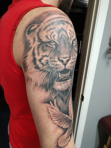 Explore tattoo for son ideas, creative tattoo ideas in Portsmouth, available at Inflicting Ink, LLC