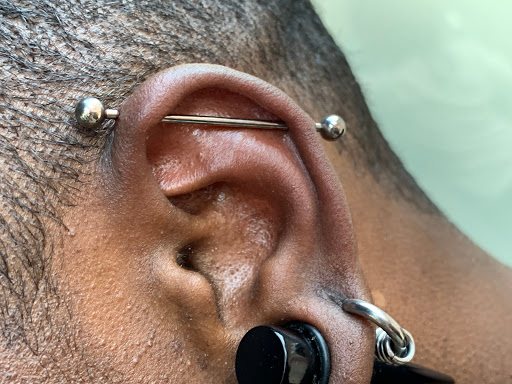 Explore tattoo name placement ideas, creative tattoo ideas in Chicago, available at Fundamental Body Piercing