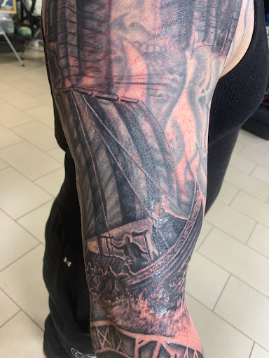 Explore tropical tattoo ideas, creative tattoo ideas in Sarasota, available at SEVEN SINS Tattoo Studio