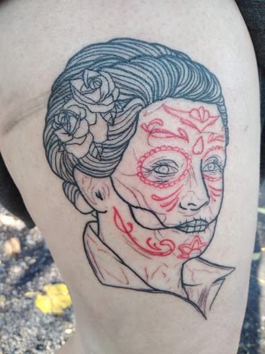 Explore gears of war tattoo ideas, creative tattoo ideas in Ithaca, available at Artistic Point Tattoo Company