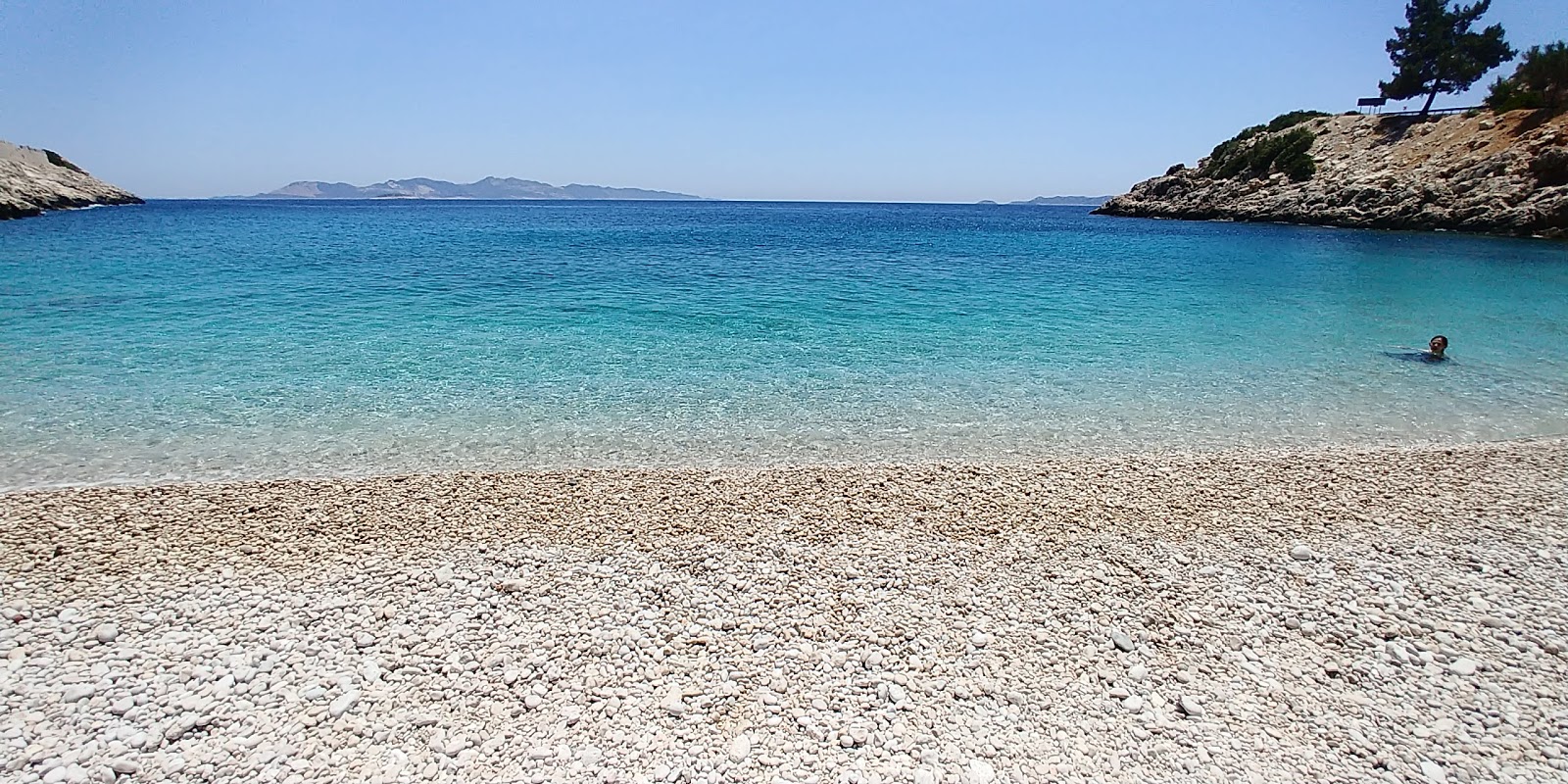 Photo of Seyrek Beach with turquoise pure water surface