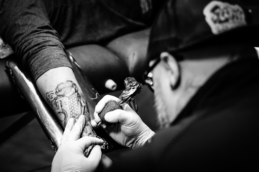 Explore kneecap tattoo ideas, creative tattoo ideas in Mchenry, available at Art and Soul Tattoo Company