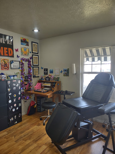 Explore meaningful elegant spine tattoo ideas, creative tattoo ideas in Spokane, available at Sweet Inks & Cool Peeps