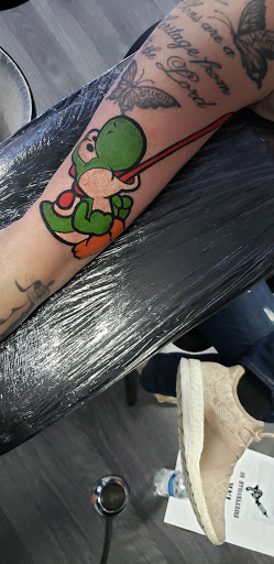 Explore tow truck tattoo ideas, creative tattoo ideas in Fayetteville, available at Evolution Ink Tattoo and Piercing Studio