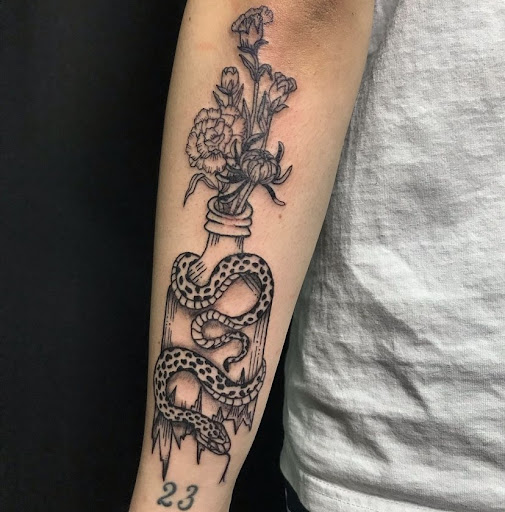 Explore shoulder tribal tattoo ideas, creative tattoo ideas in Santa Clara, available at Vampire Battle Mansion Tattoo and Piercing