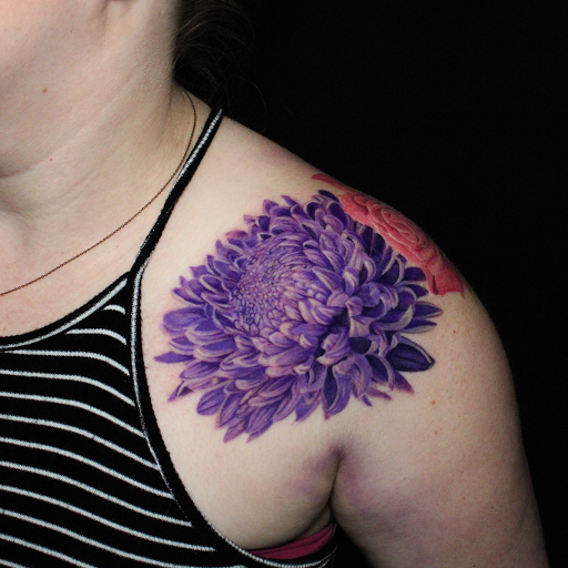 Explore punk tattoo ideas, creative tattoo ideas in Addison, available at Cat Tattoo