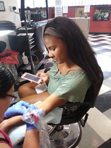 Tattoo Shop «Ink Slingers», reviews and photos, 1355 E Kearney St, Springfield, MO 65803, USA