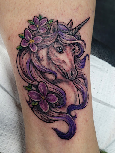 Explore black flower tattoo ideas, creative tattoo ideas in Chicago Ridge, available at Etched In Skin LLC