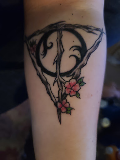 Explore cat and dog tattoo ideas, creative tattoo ideas in Ottawa, available at Audacious Ink Tattoo Studio