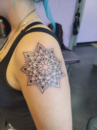 Explore magnolia tattoo ideas, creative tattoo ideas in Easley, available at Peach Pit Tattoo