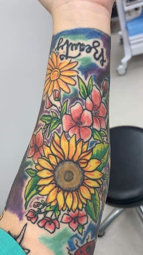 Explore neck tattoo ideas, creative tattoo ideas in Albany, available at Coast 2 Coast Body Art Studio