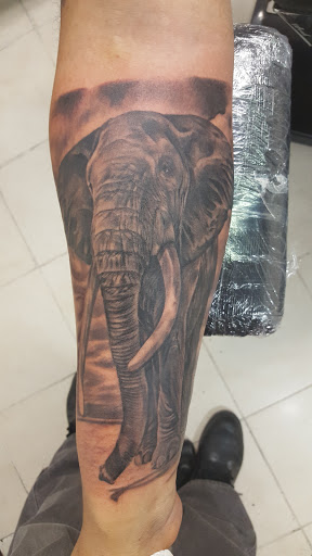 Explore flag tattoo ideas, creative tattoo ideas in Warren, available at Dark Horse Tattoo Co. LLC.