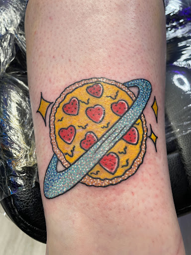 Explore atom tattoo ideas, creative tattoo ideas in Conowingo, available at In Bloom Tattoo