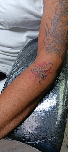 Explore cool stick and poke tattoo ideas, creative tattoo ideas in Marion, available at Kreaturs kave Tattoo studio