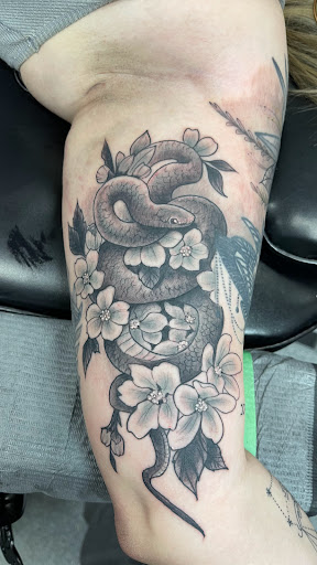 Explore skull rose tattoo ideas, creative tattoo ideas in Troy, available at All In Tattoo Co.