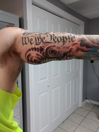 Explore mens back shoulder tattoo ideas, creative tattoo ideas in Milan, available at Apocalyptic Ink Studio