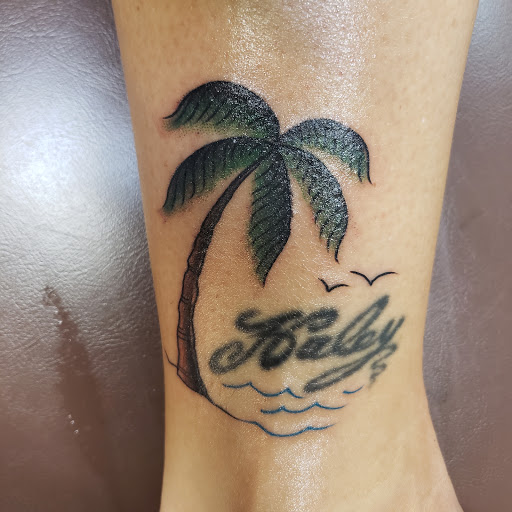 Tattoo Shop «Fat Brothers Productions», reviews and photos, 2953 E Highland Rd, Highland Charter Twp, MI 48356, USA