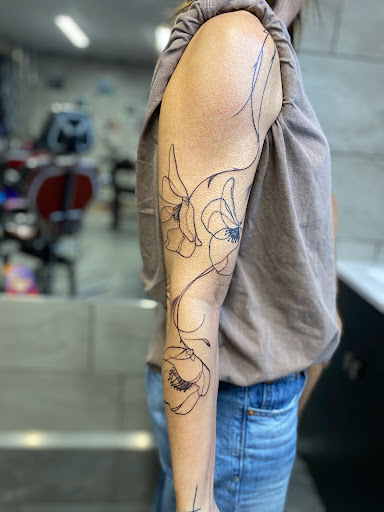 Explore chest plate tattoo ideas, creative tattoo ideas in Luverne, available at Conspiracy Tattoo MN