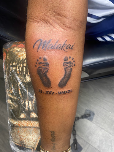 Explore hand tattoo ideas man, creative tattoo ideas in Tampa, available at Creative Stain LLC