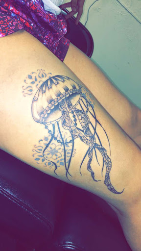 Explore flower finger tattoo ideas, creative tattoo ideas in Dalton, available at Unkut Productions Inc Tattoo Piercing Studio