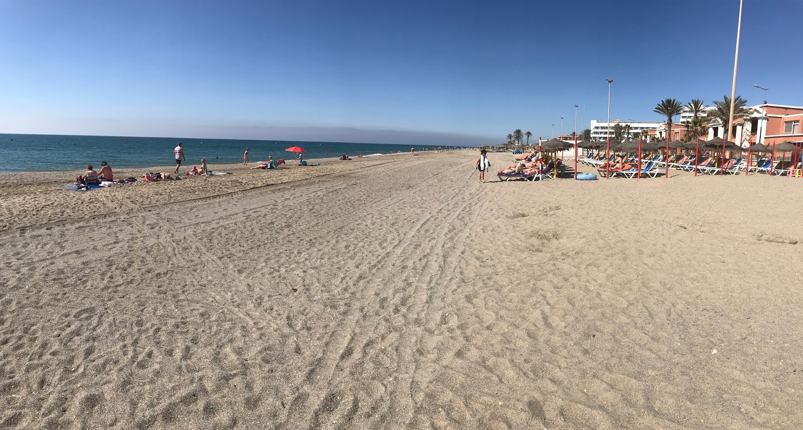 Photo de Serena Plage avec sable coquillier gris de surface