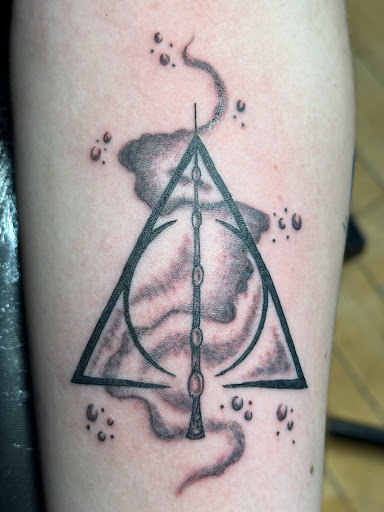 Explore dog collar tattoo ideas, creative tattoo ideas in Plattsburgh, available at Ink by Lace LLC