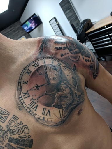 Explore maltese cross tattoo ideas, creative tattoo ideas in Fontana, available at Iconiq Tattoo Studio