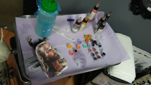 Find dragon arm tattoo ideas for your next unique tattoo in Arlington at The Chosen One Ink